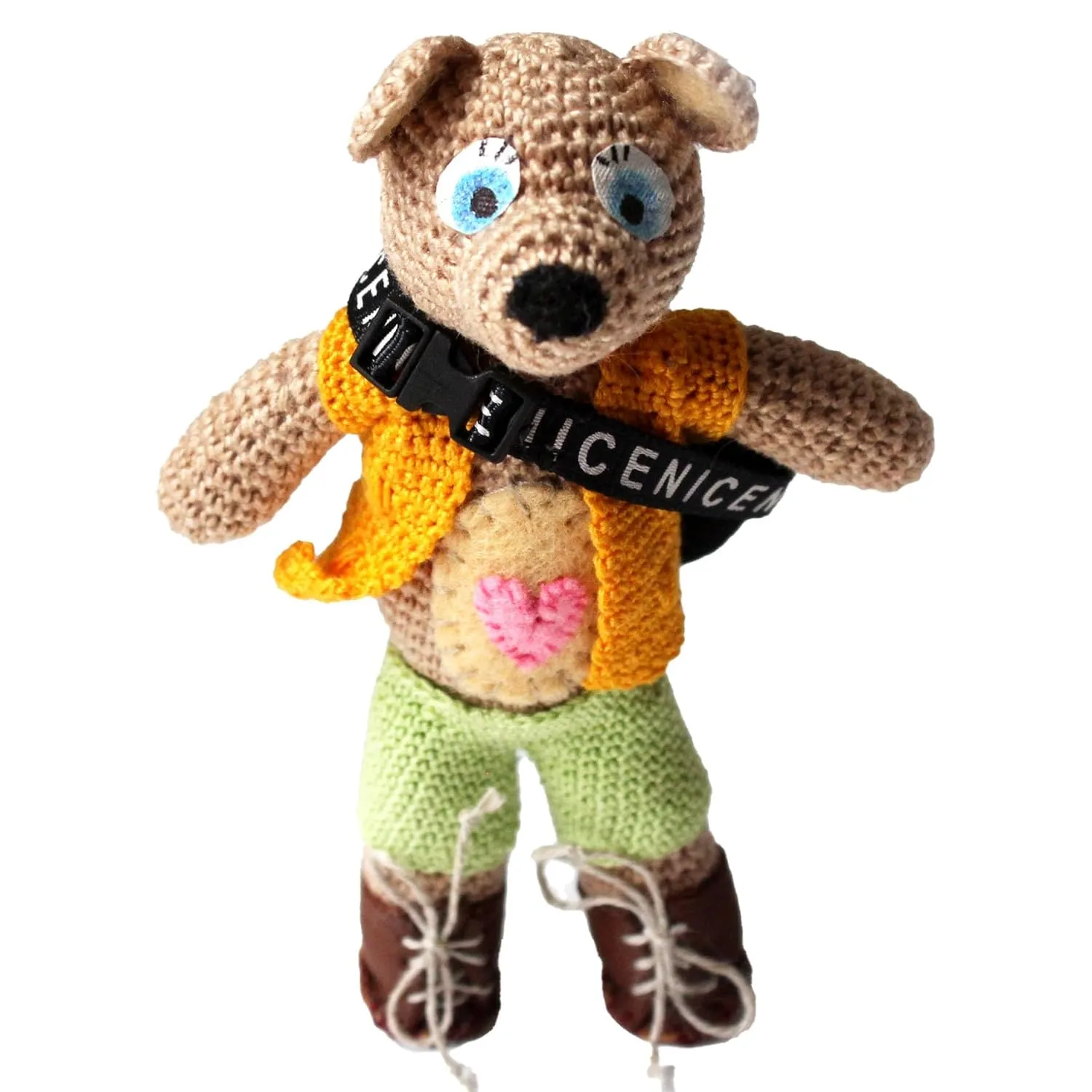 Crochet teddy bear tourist with clothes. Small cute teddy dress up