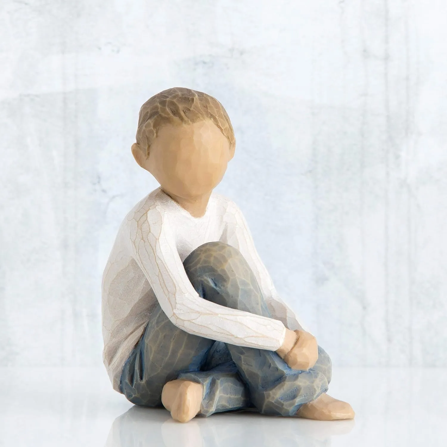 Willow Tree Caring Child, Nurtured by Your Loving Care, Seated Boy Figure in Blue Jeans, Works Well in Groupings That Reflect Family Relationships, Sculpted Hand-Painted Figure